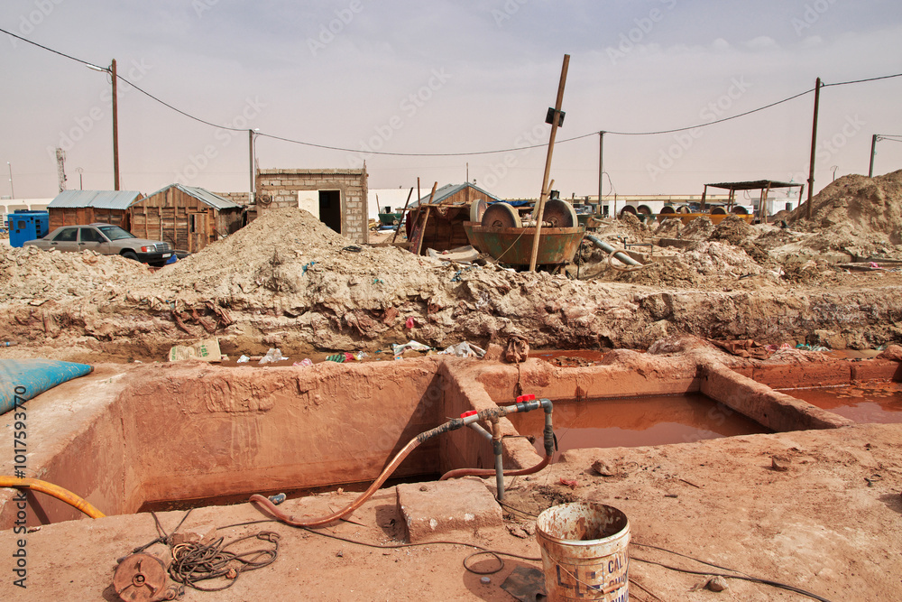 Nouakchott, Mauritania - 06 Jan 2022: Factory next to a gold mine in Sahara desert not far Nouakchott, Mauritania, West Africa