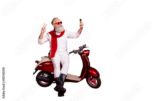 Portrait of his he nice attractive stylish trendy confident cheerful gray-haired man holding in hands phone taking making selfie showing v-sign isolated over bright vivid shine red background photo