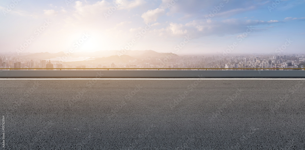 Expansive Cityscape View from a Serene Roadside Perspective Expansive Cityscape View from a Serene Roadside Perspective