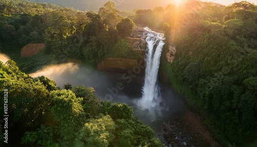  calm waterfall surrounded by lush green vegetation, bathed in golden sunset light. Soft mist rises gently from the water. Calming Rhythms