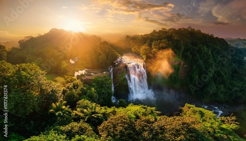  calm waterfall surrounded by lush green vegetation, bathed in golden sunset light. Soft mist rises gently from the water. Calming Rhythms