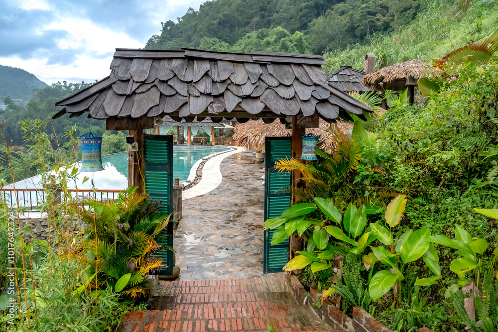 Muong Loong Ecogarden - September 22, 2024: Muong Loong Ecogarden is a luxury resort in Ky Son, Nghe An, Vietnam. It is surrounded by majestic mountains and primeval forests, offering visitors a peace Muong Loong Ecogarden - September 22, 2024: Muong Loong Ecogarden is a luxury resort in Ky Son, Nghe An, Vietnam. It is surrounded by majestic mountains and primeval forests, offering visitors a peace