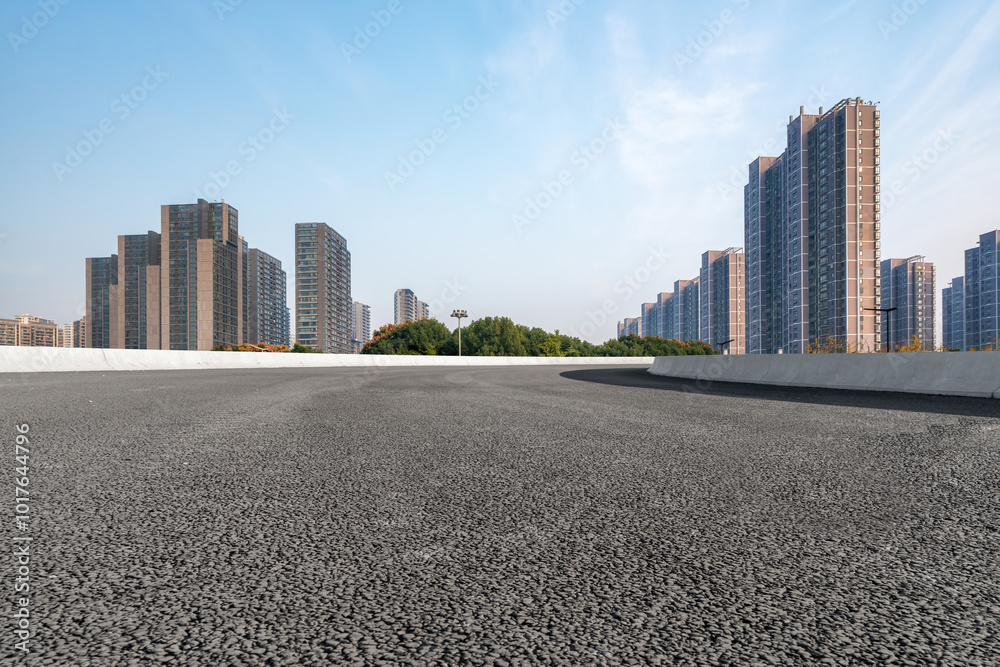 Modern Urban Landscape with Expansive Roadway and Skyscrapers Modern Urban Landscape with Expansive Roadway and Skyscrapers