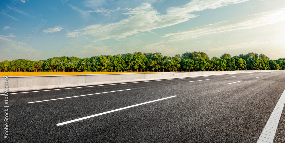 Asphalt road and green forest with sky clouds background. car background. Asphalt road and green forest with sky clouds background. car background.