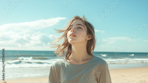 Girl in minimalist tight shirt on the beach Ideal for fashion content that emphasizes simplicity and clean, modern aesthetics at the beach.