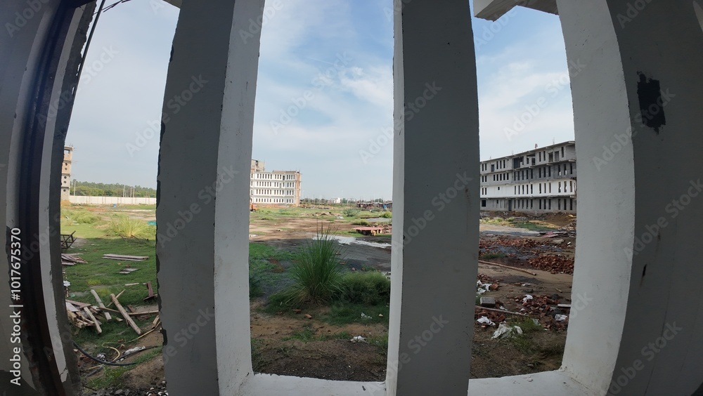 Fototapeta premium View of Construction Site Through Framed Openings