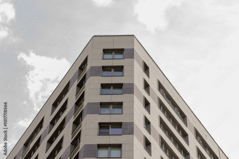 Underside view of triangular top of building over blue sky Underside view of triangular top of building over blue sky