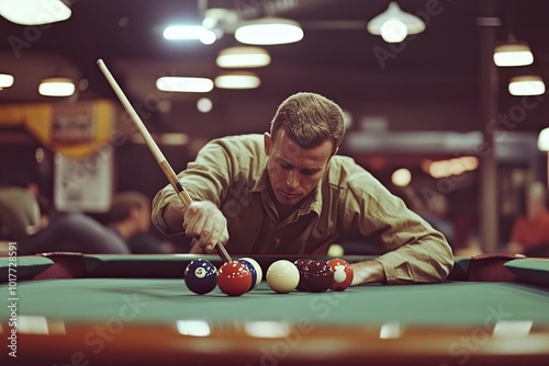 Man lining up a shot on a pool table with cue stick and balls