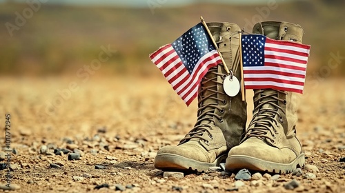 Worn old boots with dog tags and two small American flags resting on the ground in a desert landscape, symbolizing U.S. military service, sacrifice, and camaraderie. The rugged boots represent resilie photo