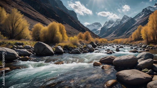 a seething river among the autumn trees in mountains  photo