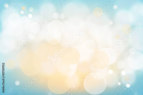 Abstract blurred festive delicate winter christmas or Happy New Year background with shiny blue yellow and white bokeh lighted stars. Space for your design. Card concept.