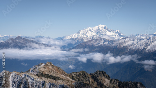 sunning panoramic view of the Mont Blanc in autumn. Snowy mountains in autumn in the french alps. beautiful colors, blue sky, sea of clouds