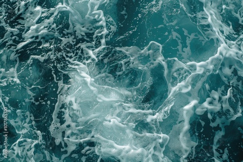 Closeup of foamy turquoise ocean water.