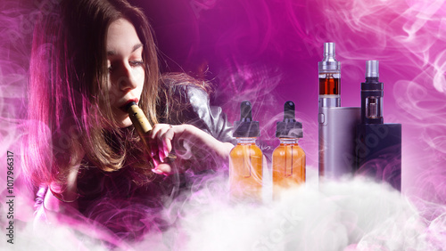 Woman vaper. Girl uses vape...