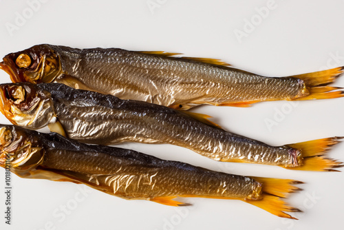 Dried fish on white. Food seafood concept. Close up of dried fish in the river with white. Close up of dried fish in the lifestyle river with white. photo