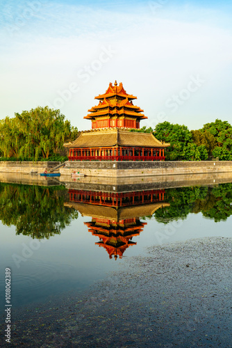 Magnificent view of Watch Tower and moat surface reflection in the Forbidden City, Beijing, China