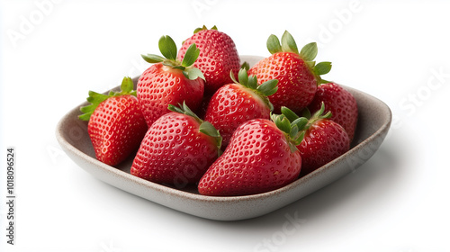 bowl of fresh, ripe strawberries with vibrant red color and green leaves, placed on white background.