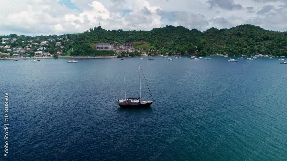 Aerial Orbit of Anchored Recreational Sailing Boat on Samana Bay, Dominican
