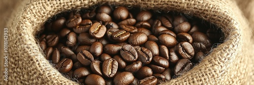 Coffee Beans in Burlap, intimate view of coffee beans nestled in a textured burlap sack, highlighting their rich color and surface details
