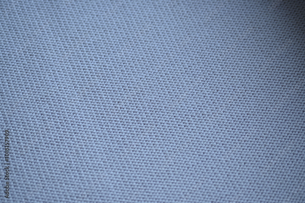 Macro texture of wool blue crocheted sweater as background, close-up of pastel blue crocheted front, blue crocheted back, texture of wool wool, blue crocheted front Macro texture of wool blue crocheted sweater as background, close-up of pastel blue crocheted front, blue crocheted back, texture of wool wool, blue crocheted front