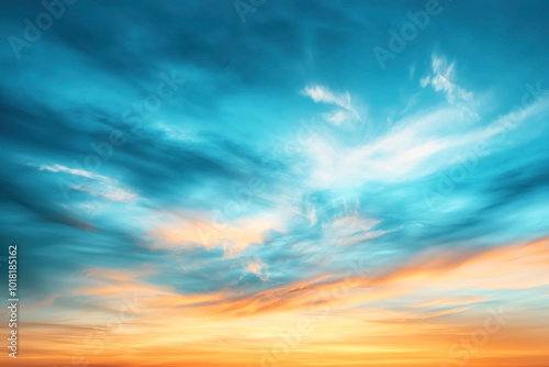 Vibrant sunset sky with a gradient of blue and orange hues and scattered clouds creating a picturesque natural scene.