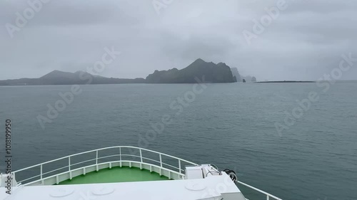 View from ferry approaching Heimaey Island on a foggy day