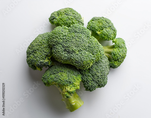 broccoli, isolated against a clean, smooth white background