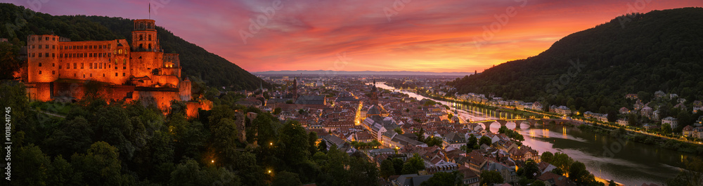 Obraz premium Heidelberg, Germany, with colorful dusk sky and glowing castle
