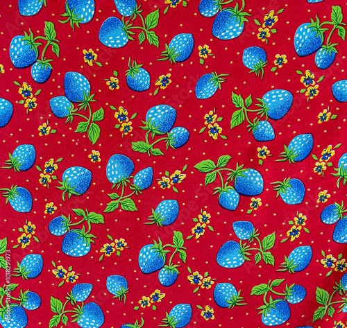 The blue strewberry and little flower repaet printed on fabric photo