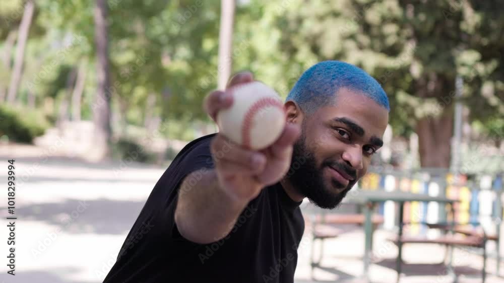 Black african american man showing a baseball ball in his hand in the throwing position.MOV Black african american man showing a baseball ball in his hand in the throwing position.MOV