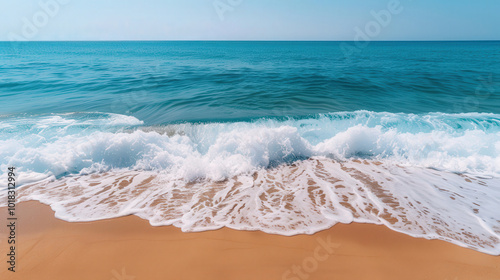 Wallpaper Mural Dynamic Ocean Waves on Sandy Beach, vibrant surf crashing energetically against the shore, creating a refreshing and lively coastal atmosphere, inviting tranquility and adventure Torontodigital.ca