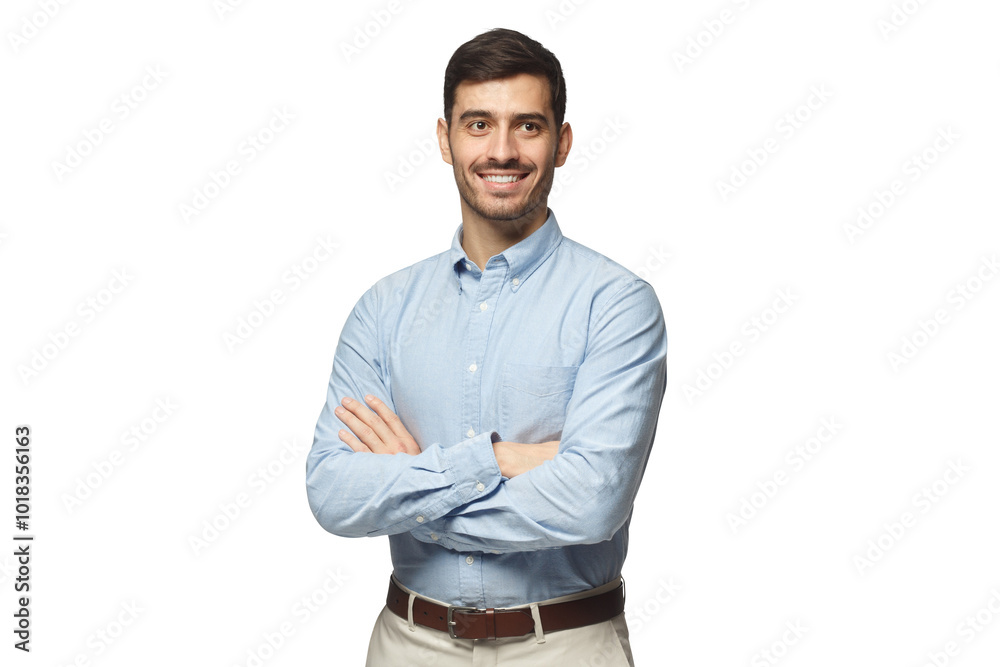 Modern businessman in blue shirt standing with crossed arms Modern businessman in blue shirt standing with crossed arms