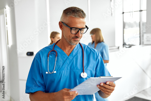 Wallpaper Mural Confident and Professional Male Doctor in Scrubs with Stethoscope in a Modern Healthcare Setting Torontodigital.ca