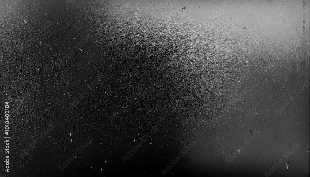Monochromatic Texture. Subtle Gradient on Matte Black Canvas with Minimalistic Speckled Surface Monochromatic Texture. Subtle Gradient on Matte Black Canvas with Minimalistic Speckled Surface