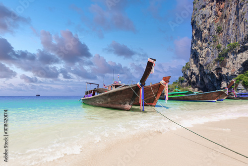 Ao Phra Nang beach, Ao Nang, Krabi, Phra Nang tropical beach in Krabi, Thai traditional wooden longtail boat and beautiful sand Ao Phra Nang Beach in Ao Nang, Krabi, Thailand. photo