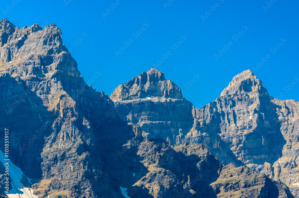 Scenery of high mountain peak over blue sky with white clouds. Scenery of high mountain peak over blue sky with white clouds.