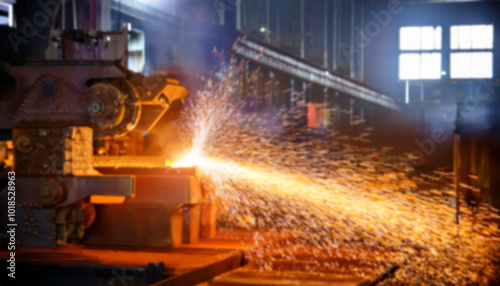 metal cutting machine in a factory setting. Sparks fly as the powerful machine grinds through a metal beam, creating a dynamic display of energy and heat. The environment around the machine reflects