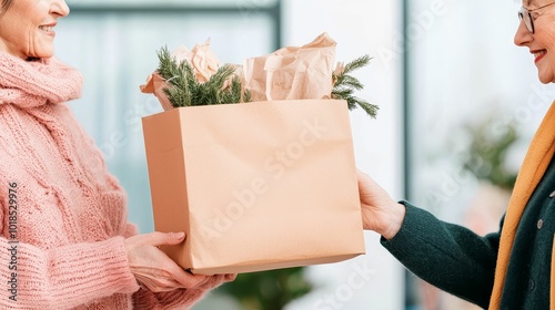 Volunteers delivering care packages to elderly people in a warm neighborhood setting photo