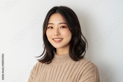 Portraits of Asian women in simple casual attire, standing against plain white background, wear minimal makeup display natural expressions, emphasizing modern, everyday style.