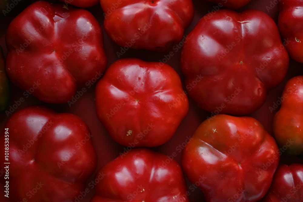 texture of red bell peppers as a background, autumn ripe juicy red bell peppers as a background, juicy organic food texture of red bell peppers as a background, autumn ripe juicy red bell peppers as a background, juicy organic food