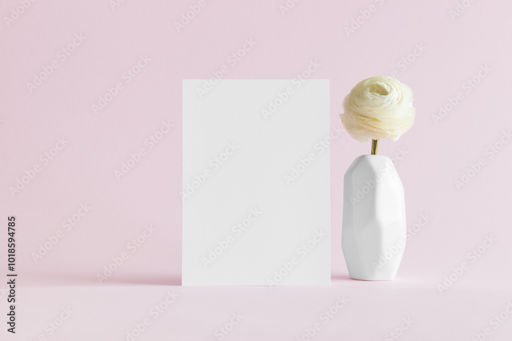 White invitation card mockup with a rose on the soft pink background. 5x7 ratio, similar to A6, A5. White invitation card mockup with a rose on the soft pink background. 5x7 ratio, similar to A6, A5.