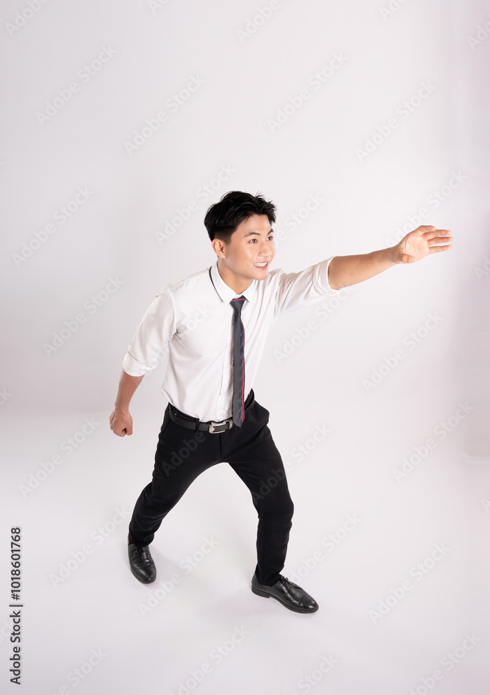 Full body of young Asian businessman posing on white background
Full body of young Asian businessman posing on white background