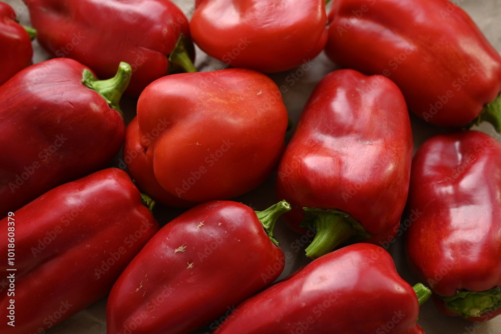 texture of red bell peppers as a background, autumn ripe juicy red bell peppers as a background, juicy organic food texture of red bell peppers as a background, autumn ripe juicy red bell peppers as a background, juicy organic food