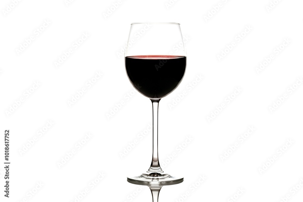 A full glass of red wine against a white background. A full glass of red wine against a white background.