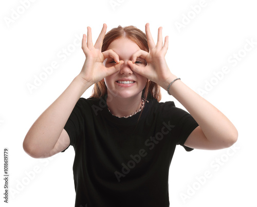 Cheerful teenage girl posing on white background