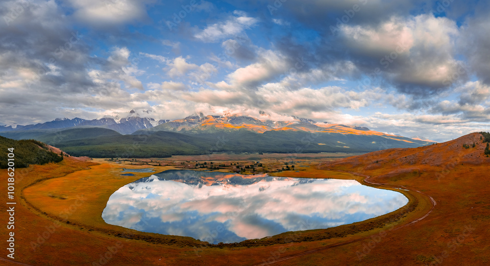 Fototapeta premium Beautiful landscape crystal clear mountain lake with sky reflection, autumn Altai