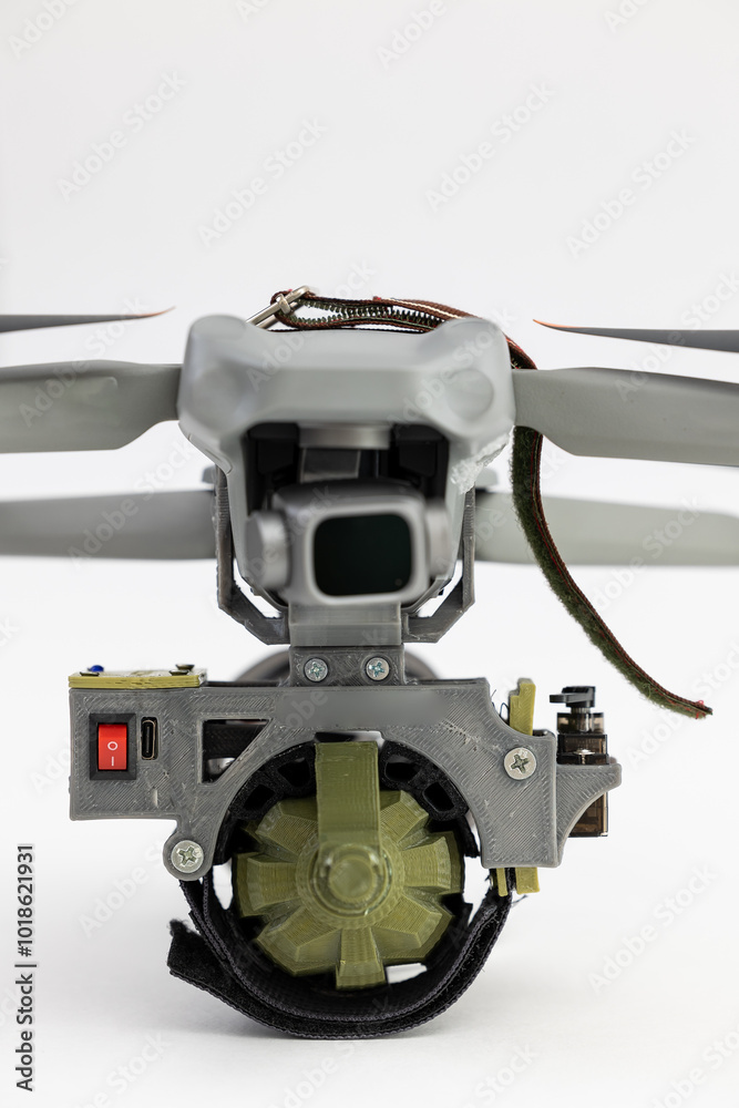 Naklejka premium Engineering development for war, army drone with mechanism for dropping grenades on white isolated background. Concept military UAVs using in weapon