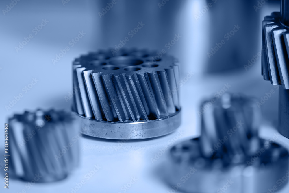 Macro photo metal engine gear wheels. Industrial background blue toning, concept fix service Macro photo metal engine gear wheels. Industrial background blue toning, concept fix service