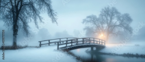  A bridge spanning a body of water, its end marked by a beacon through foggy conditions photo