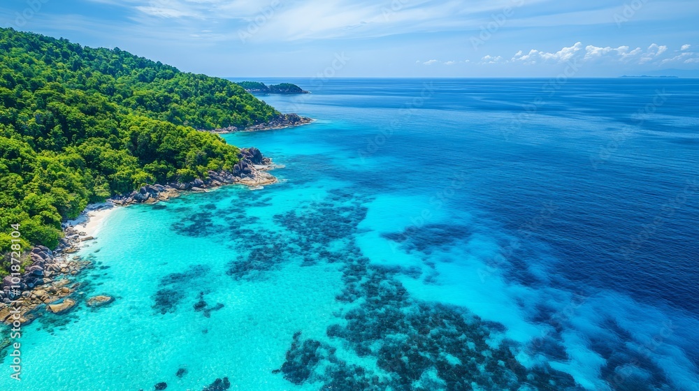 Aerial view of a tropical island with clear blue water, lush green vegetation, and a sandy beach. Aerial view of a tropical island with clear blue water, lush green vegetation, and a sandy beach.